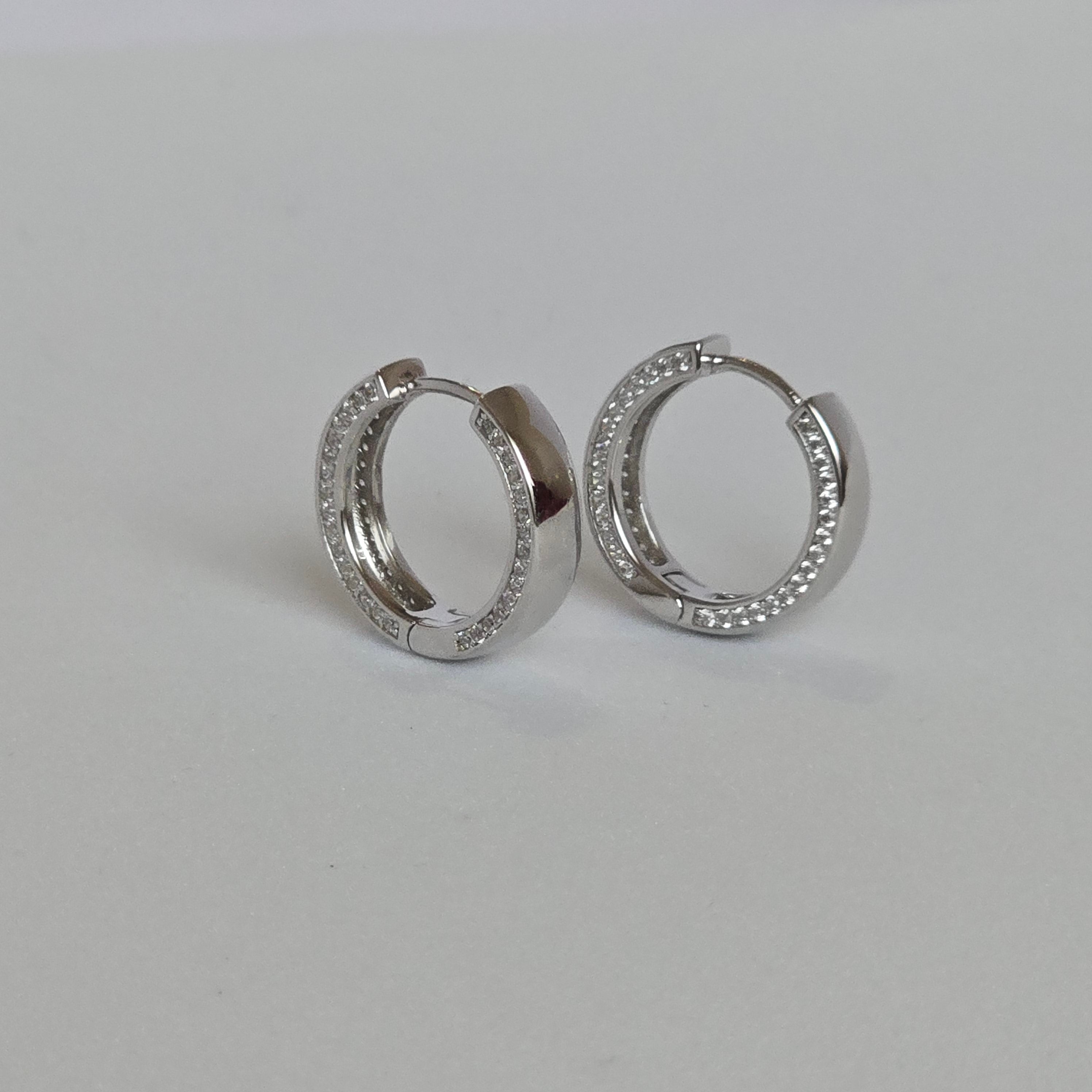 Huggie Lux Earrings in 925 Silver and Zirconia