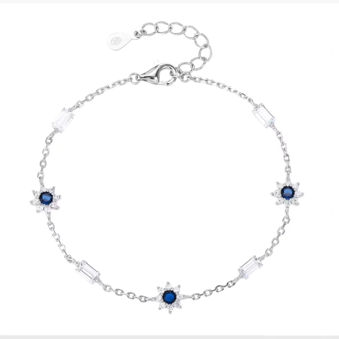 Bracciale Geometrico Vibrant Geo in Argento 925 con Castoni Rubino e Zirconi Baguette