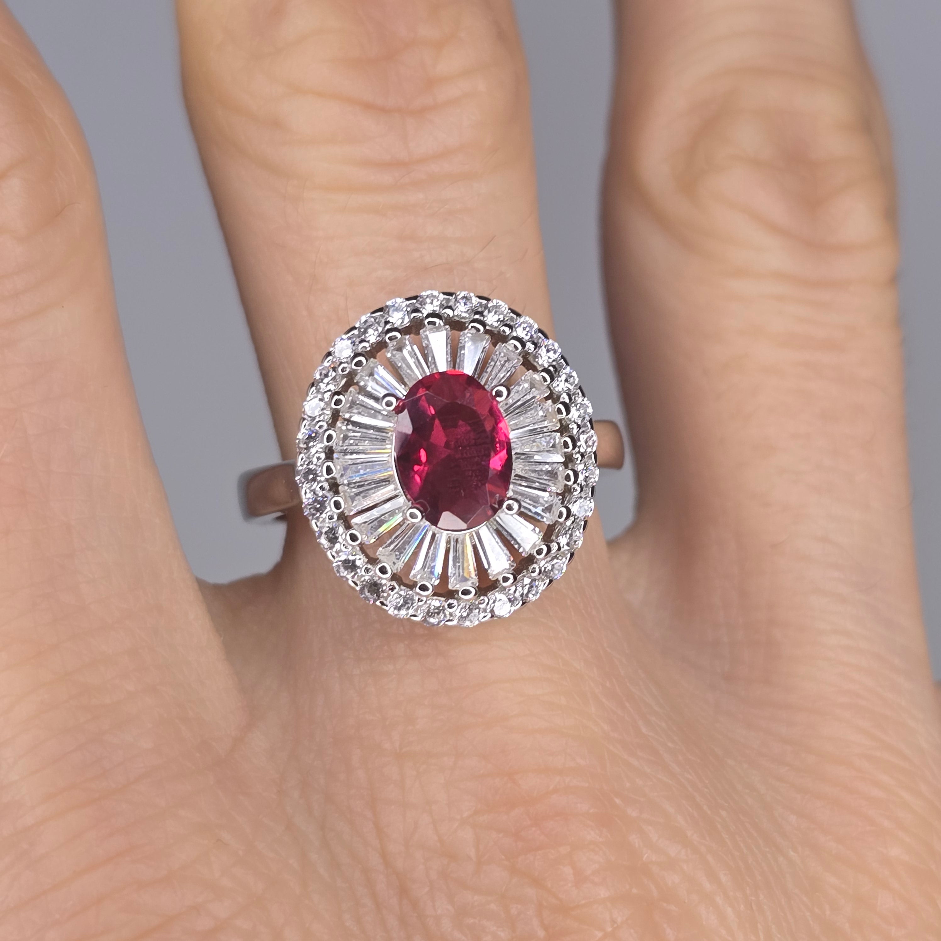 Royal Ring in 925 Silver with Red Zircon and Double Zircon Frame