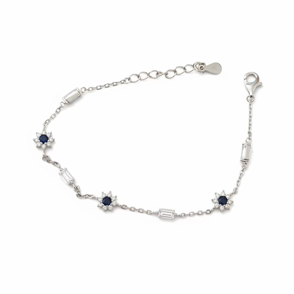 Bracciale Geometrico Vibrant Geo in Argento 925 con Castoni Rubino e Zirconi Baguette
